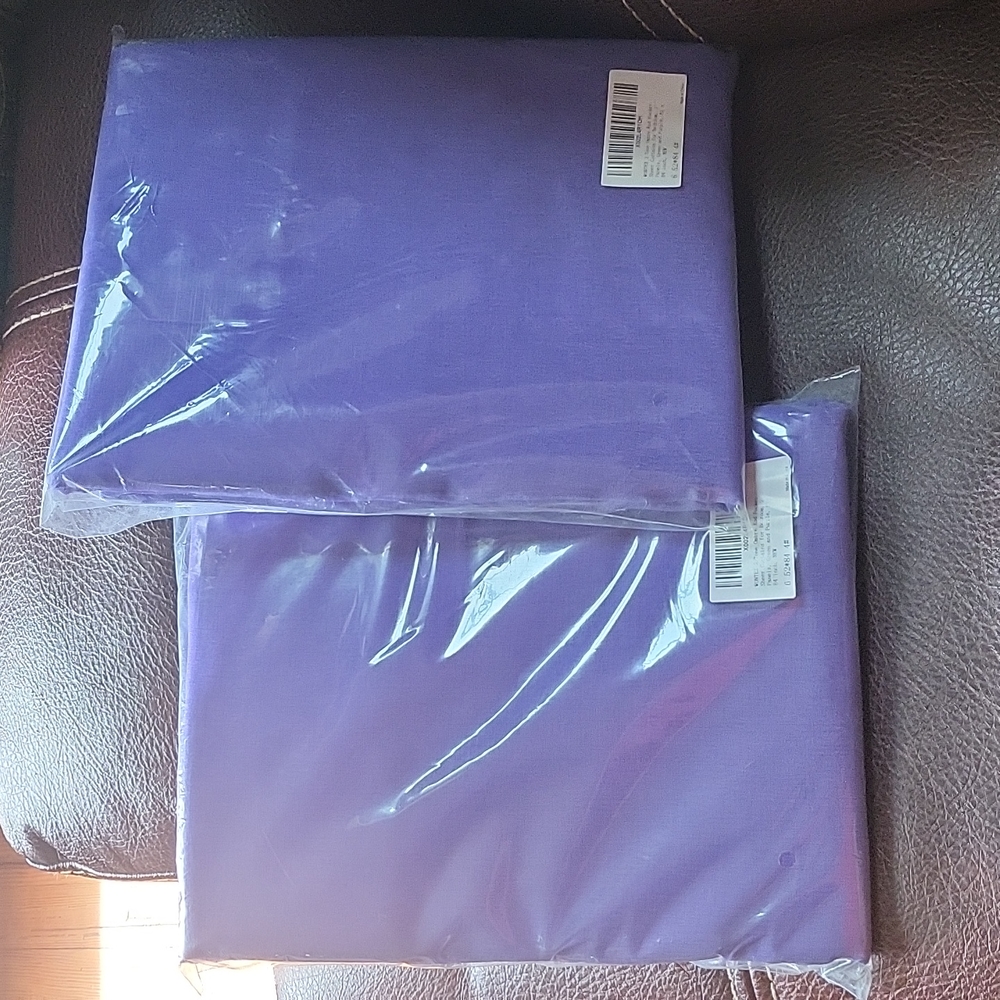 2 packages of Ombre curtains 52x84 purple and teal. New in packaging